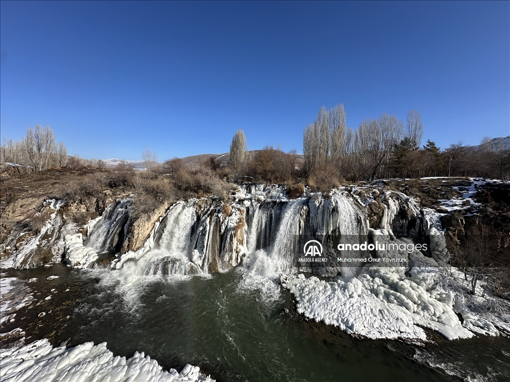 Partially frozen Muradiye Waterfall in Turkiye's Van