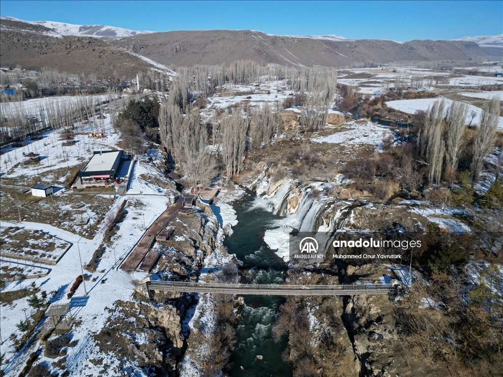 Partially frozen Muradiye Waterfall in Turkiye's Van