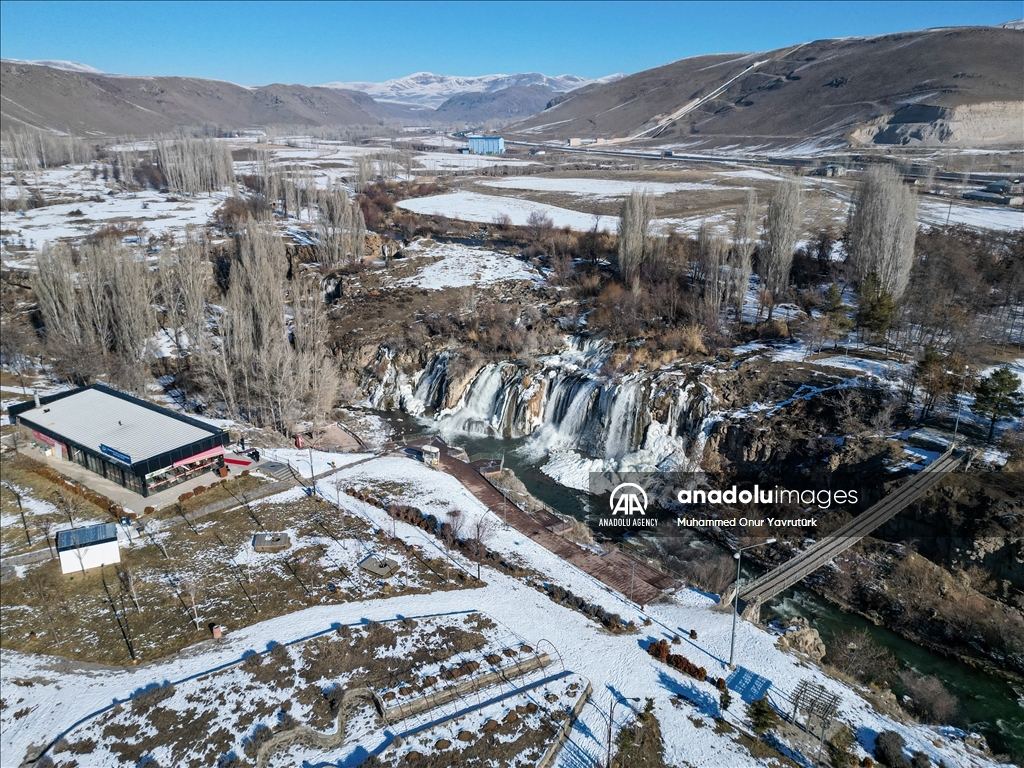 Partially frozen Muradiye Waterfall in Turkiye's Van