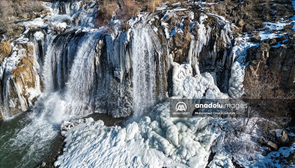 Partially frozen Muradiye Waterfall in Turkiye's Van