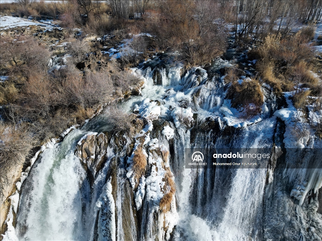 Partially frozen Muradiye Waterfall in Turkiye's Van