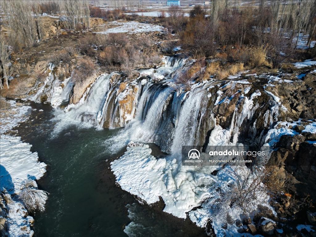 Partially frozen Muradiye Waterfall in Turkiye's Van