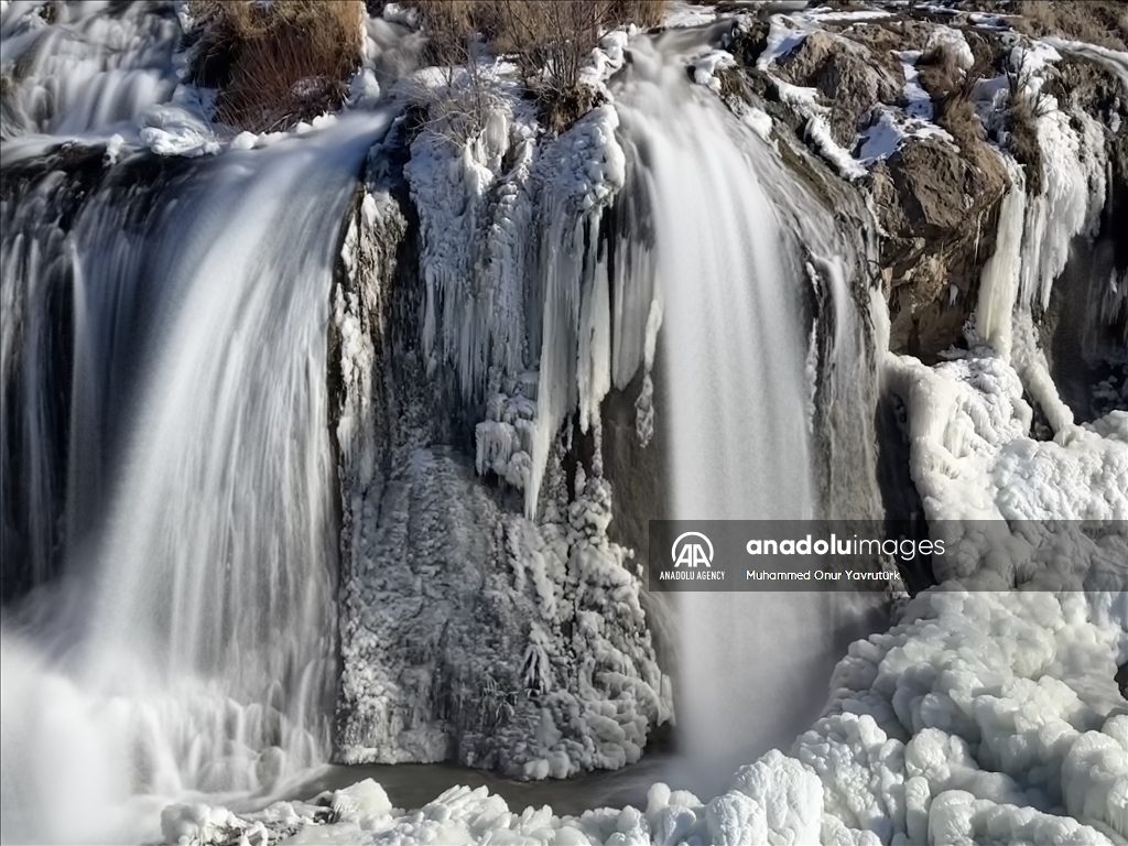 Partially frozen Muradiye Waterfall in Turkiye's Van