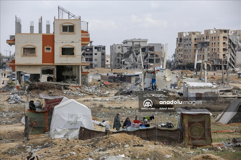 Ateşkesin ardından Deyr Belah'a dönen Filistinliler, yıkım ve enkazla karşılaştı