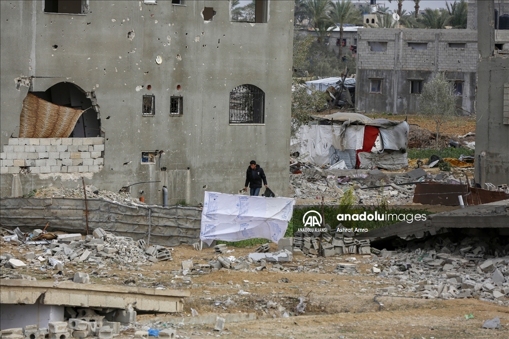 Ateşkesin ardından Deyr Belah'a dönen Filistinliler, yıkım ve enkazla karşılaştı