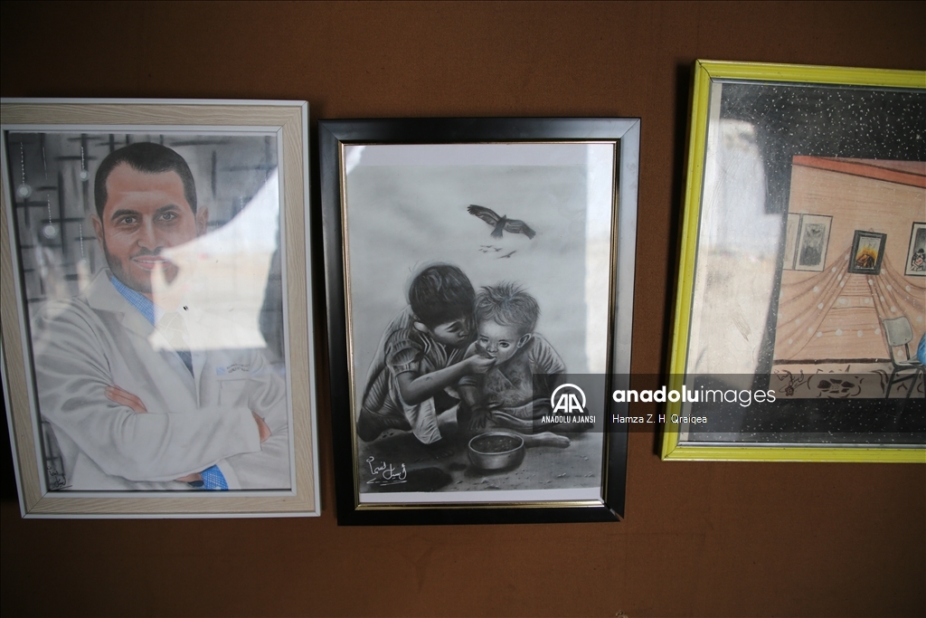 Filistinli sanatçı, resimleriyle Gazzelilerin verdiği mücadeleyi dünyaya duyurmaya çalışıyor