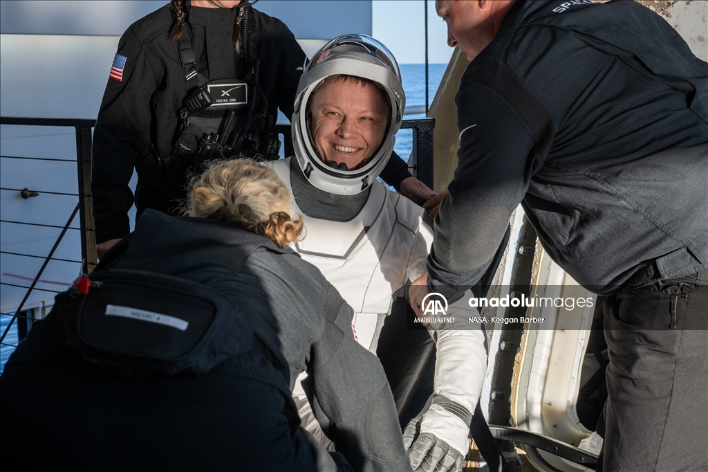 NASA astronauts return to earth after 9-month delay