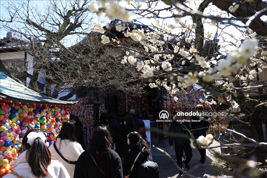 Fushimi Inari Shrine in Kyoto welcomes tourists and locals, reflecting daily life