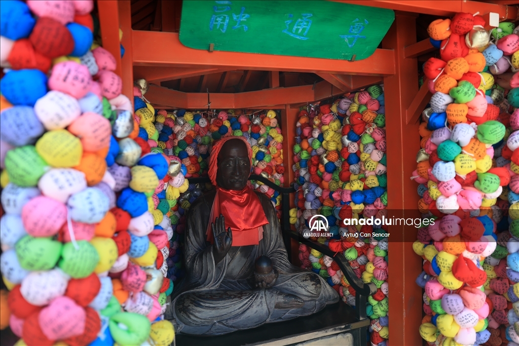 Fushimi Inari Shrine in Kyoto welcomes tourists and locals, reflecting daily life