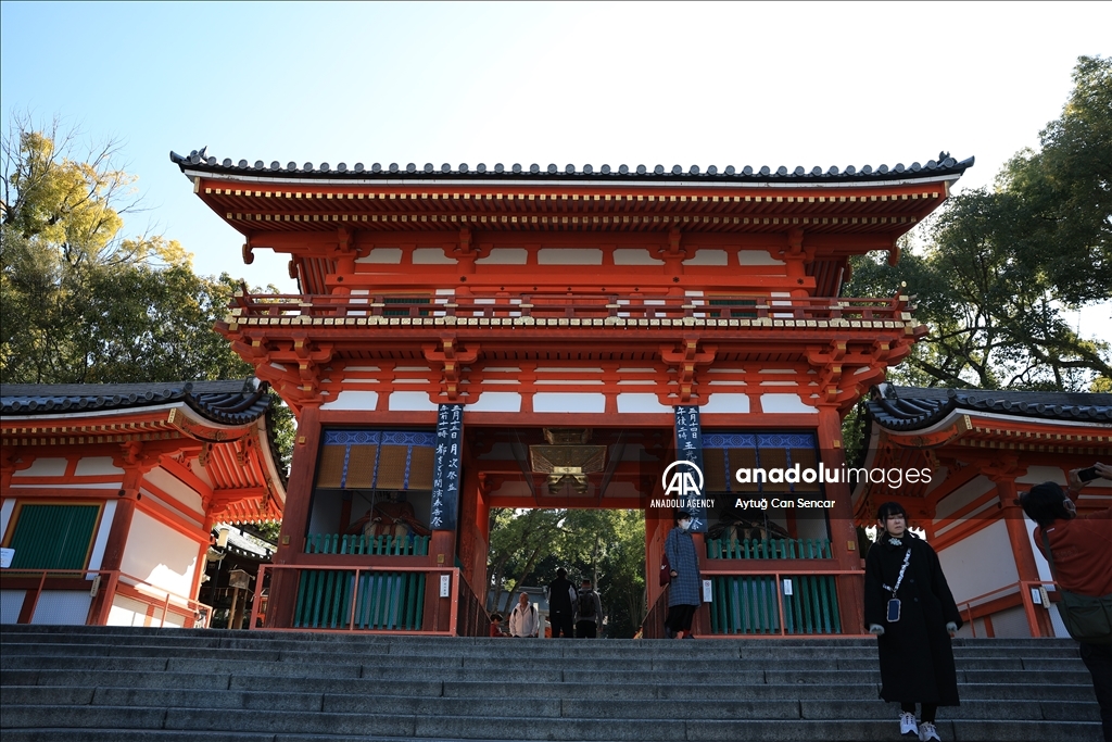Fushimi Inari Shrine in Kyoto welcomes tourists and locals, reflecting daily life