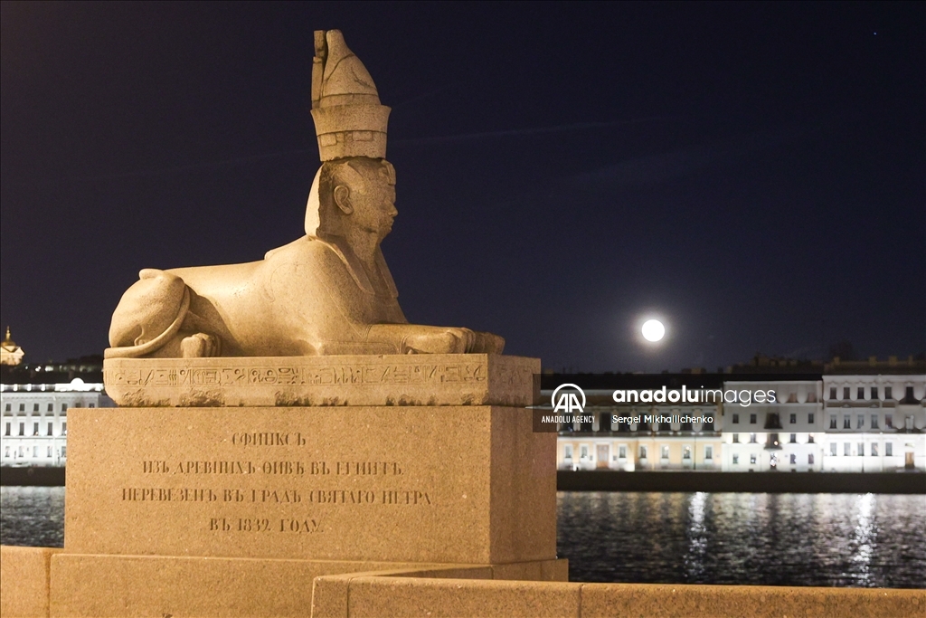 Full moon rises over Saint-Petersburg