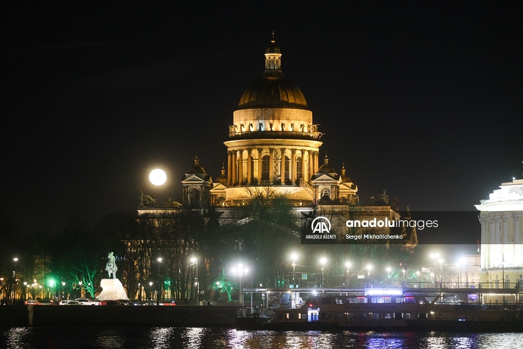 Full moon rises over Saint-Petersburg