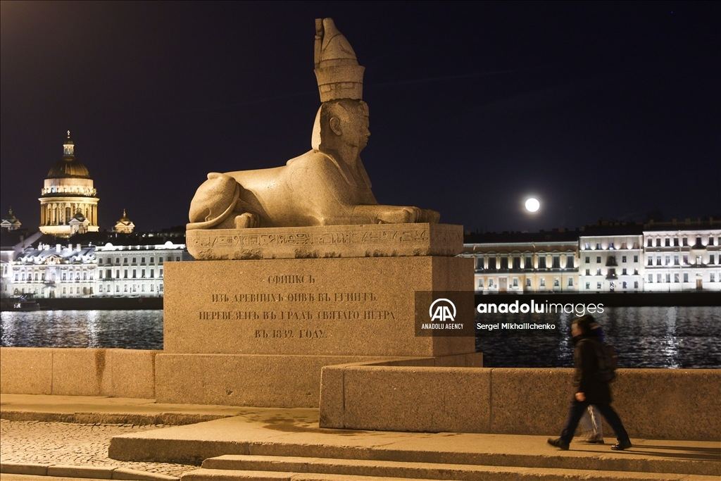 Full moon rises over Saint-Petersburg