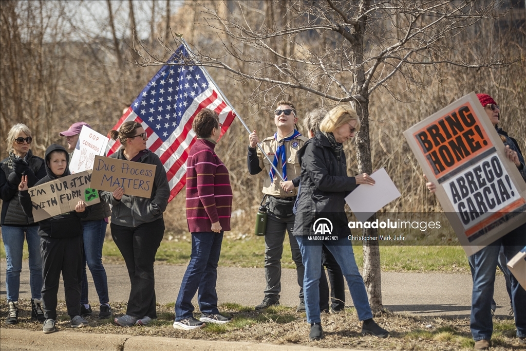 Demonstrators gather outside the El Salvador Consulate to protest the government arrests in Minnesota