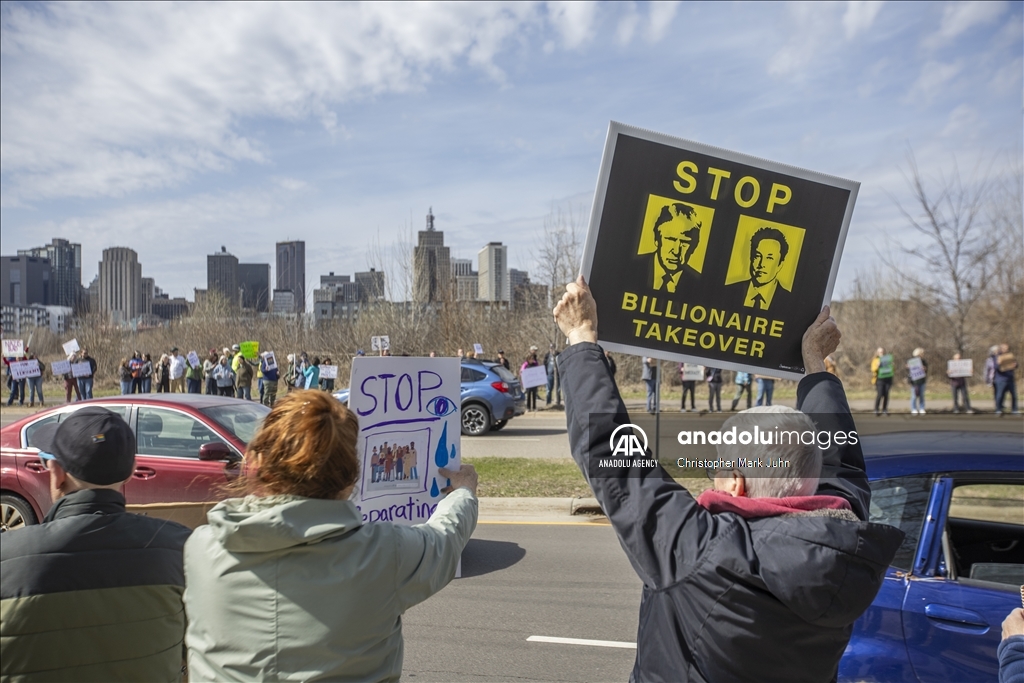 Demonstrators gather outside the El Salvador Consulate to protest the government arrests in Minnesota