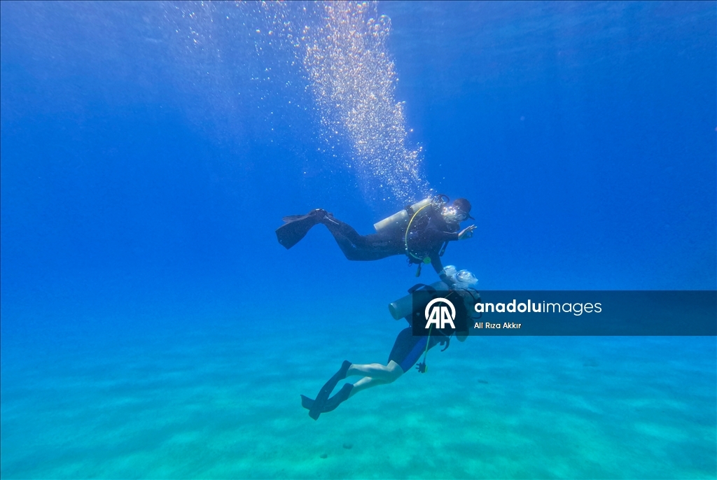 Diving enthusiasts explore the underwater riches of Fethiye, Mugla