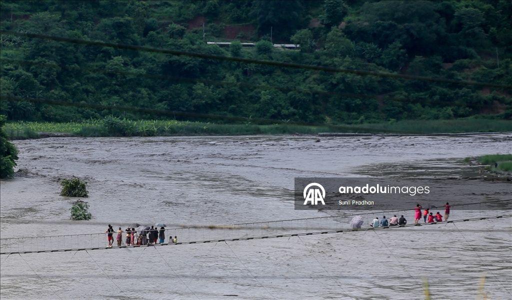 Nepal-Çin sınırında muson kaynaklı selde kaybolan 18 kişi için kurtarma çalışması başlatıldı 