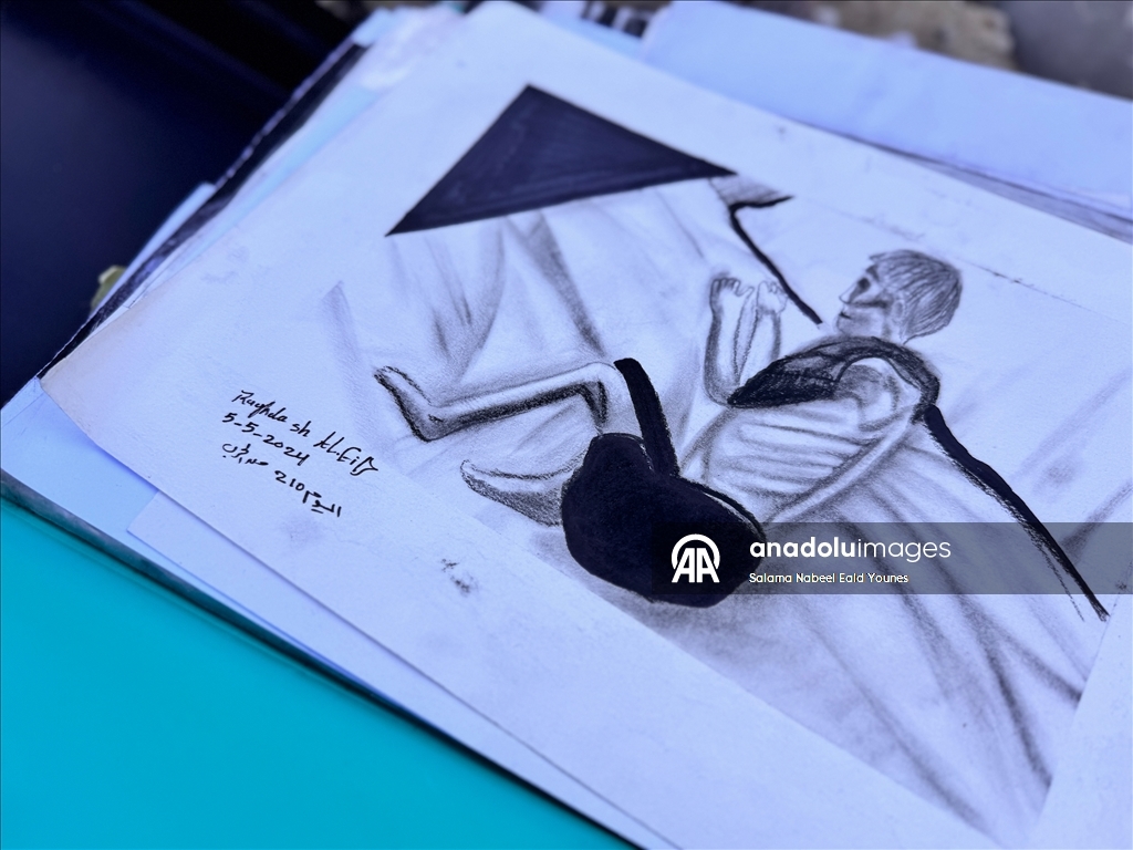 Gazzeli ressam, tencere isiyle halkının yaşadığı acıları yansıtıyor