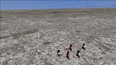 Motorcycle riders highlight climate crisis at dried-up Lake Aksehir