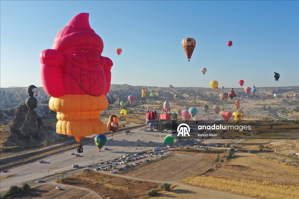 Hot air balloons with figures brighten up the skies of Cappadocia