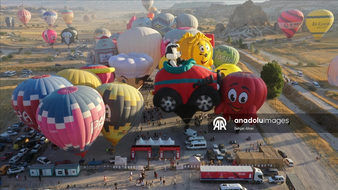 Hot air balloons with figures brighten up the skies of Cappadocia