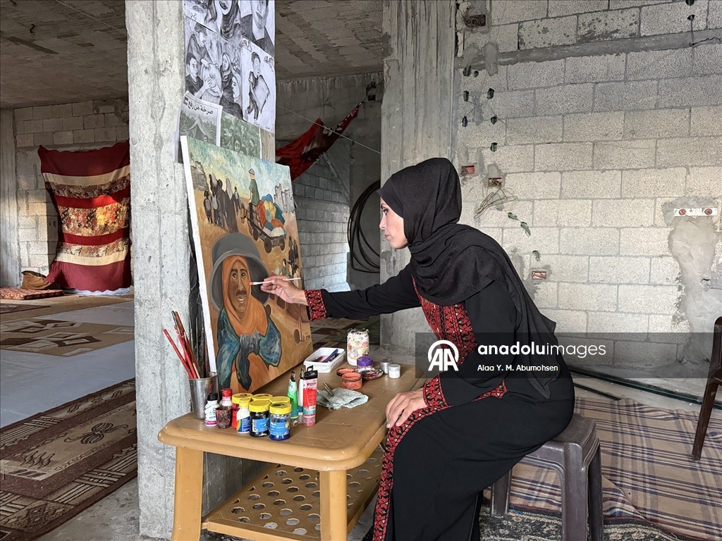 Gazze’de yerinden edilen sanatçı, resimleriyle savaşın acılarını belgeliyor