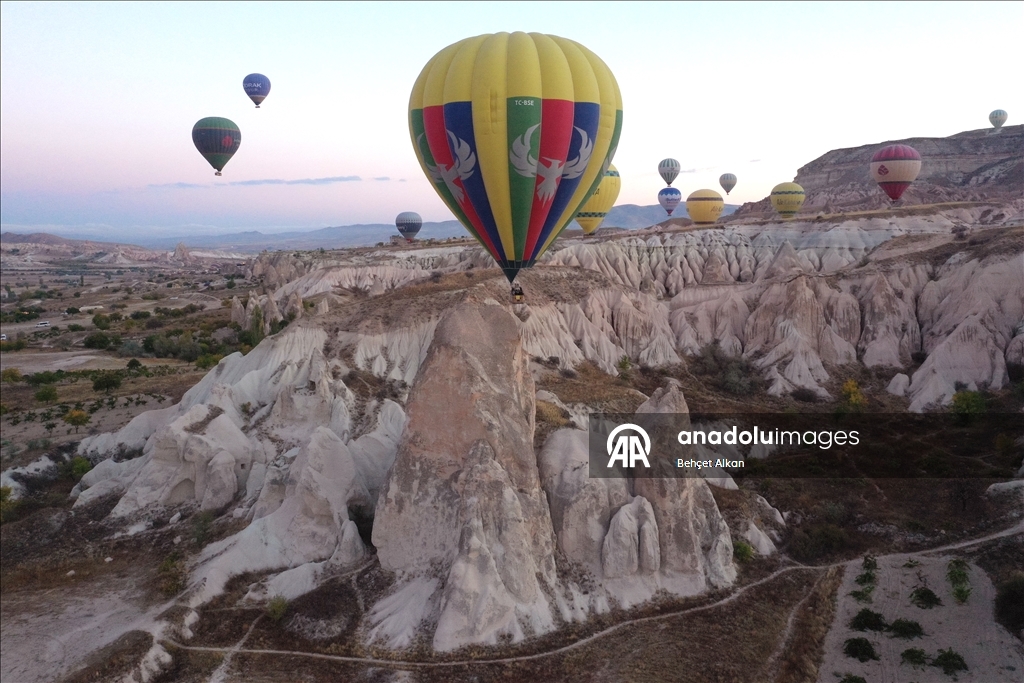Hot air balloons add color to the valleys in Cappadocia