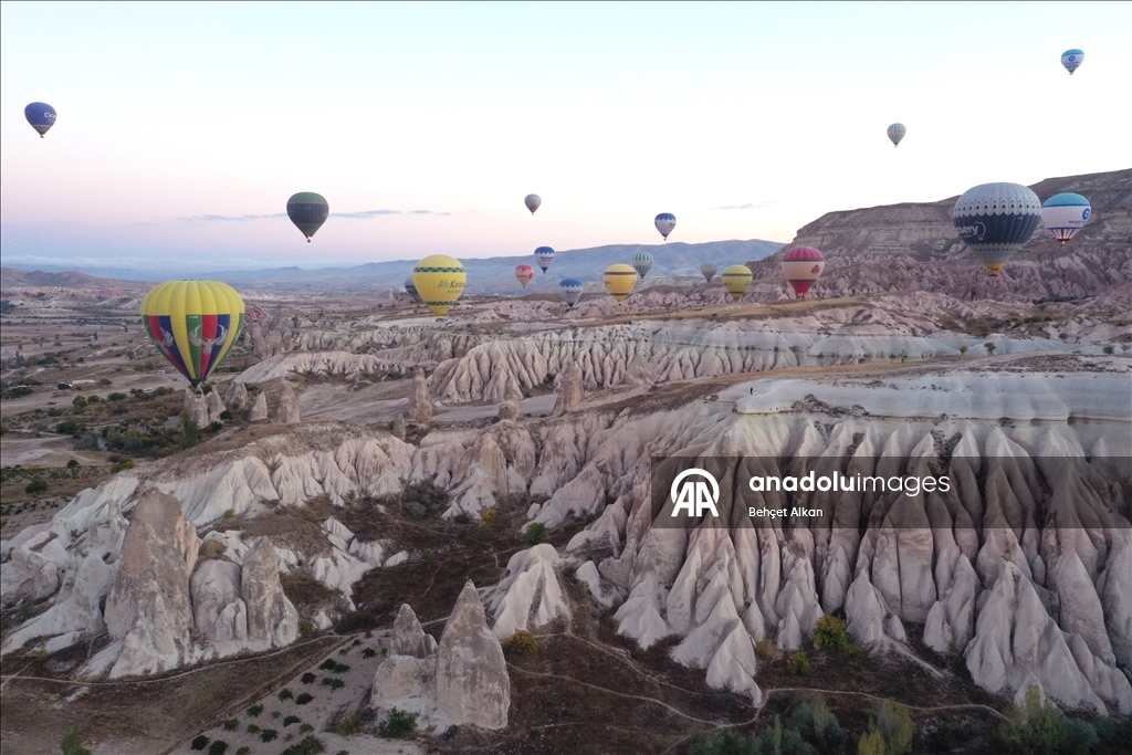 Hot air balloons add color to the valleys in Cappadocia