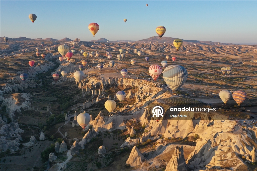 Hot air balloons add color to the valleys in Cappadocia
