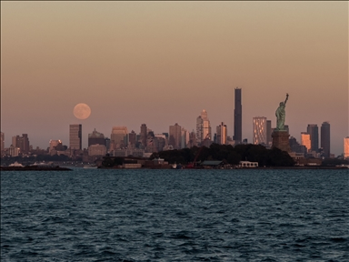 The Harvest Supermoon rises over New York City as seen from Jersey City, NJ, United States