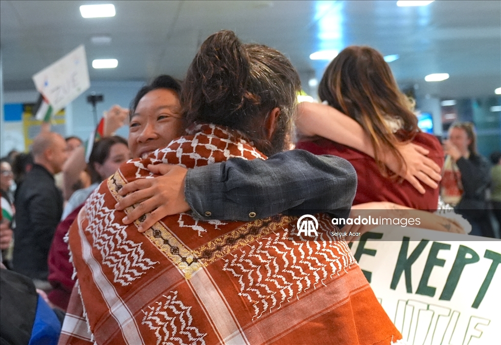 US flotilla activists return home after detention by Israeli forces