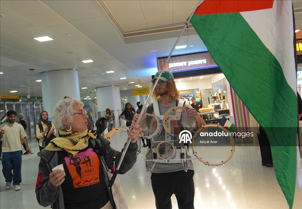 US flotilla activists return home after detention by Israeli forces