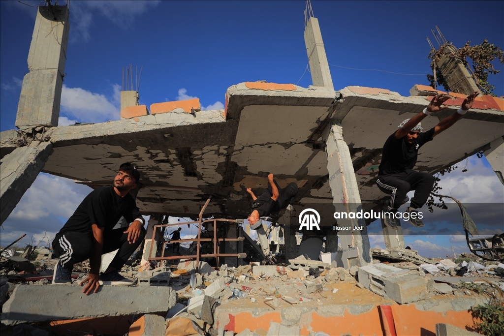 Young Gazan athletes turn war ruins into a parkour arena