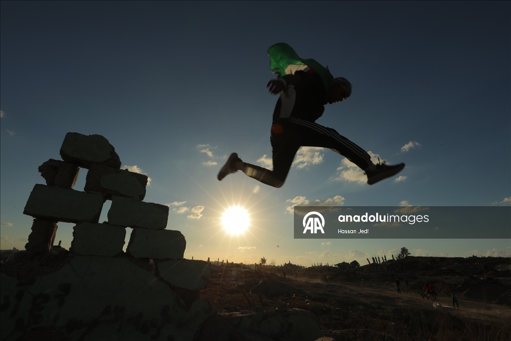 Young Gazan athletes turn war ruins into a parkour arena
