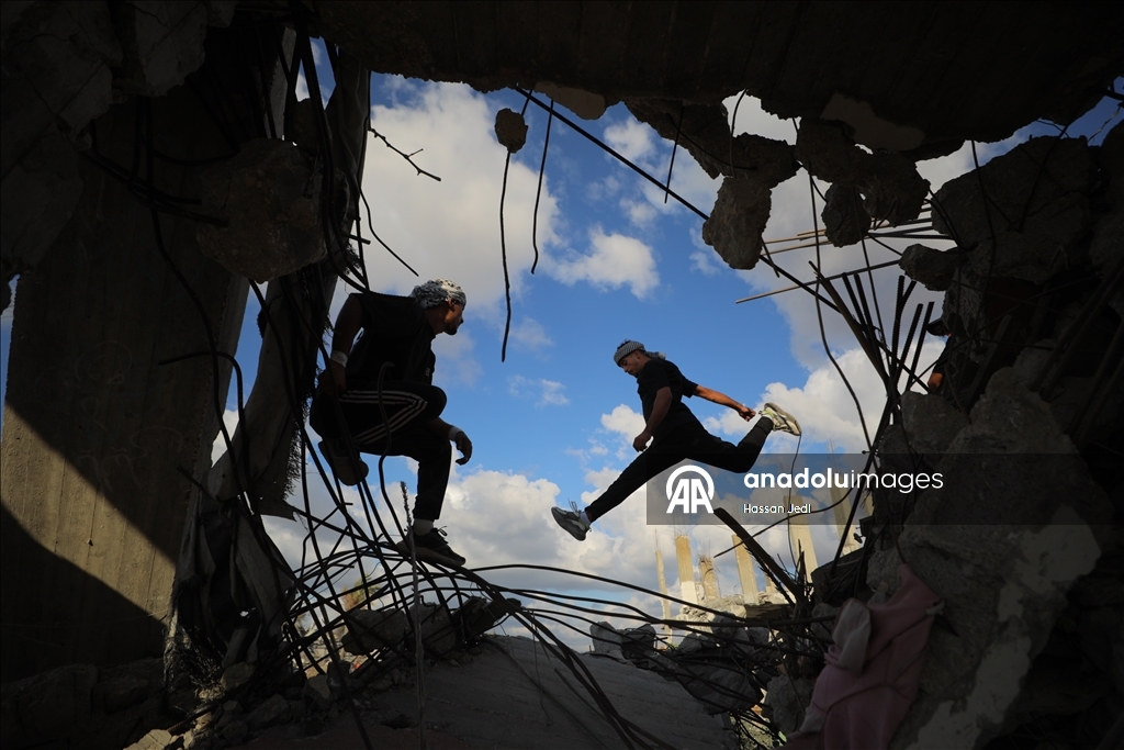 Young Gazan athletes turn war ruins into a parkour arena