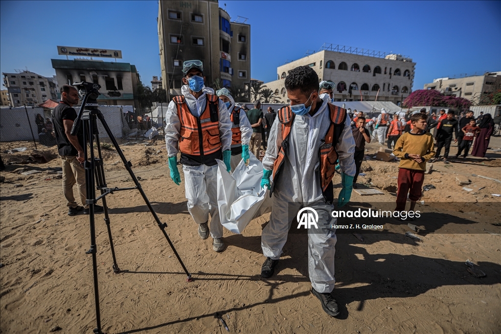 Gazze'de kimlikleri tespit edilemeyen Filistinlilerin naaşları Deyr Belah'a nakledildi