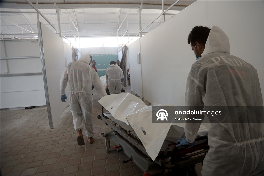 Red Cross delivers bodies of Palestinians handed over under ceasefire deal 