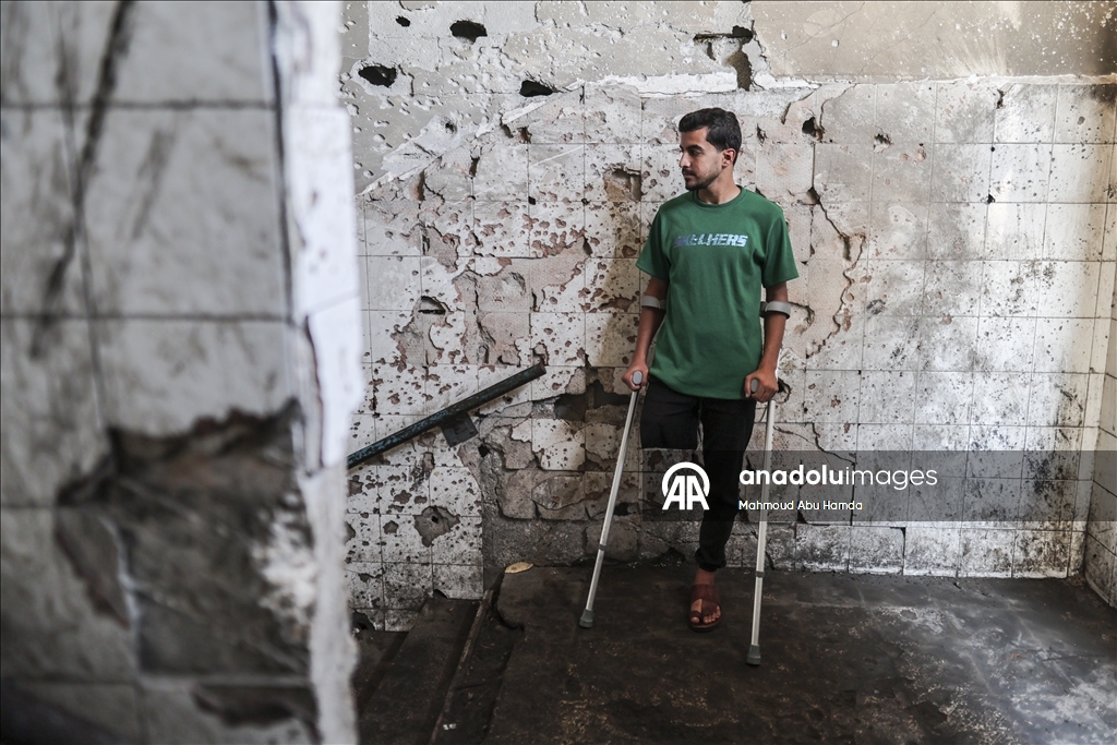 Палестинец Махмуд Саллуут, ставший инвалидом после израильских атак, борется за жизнь