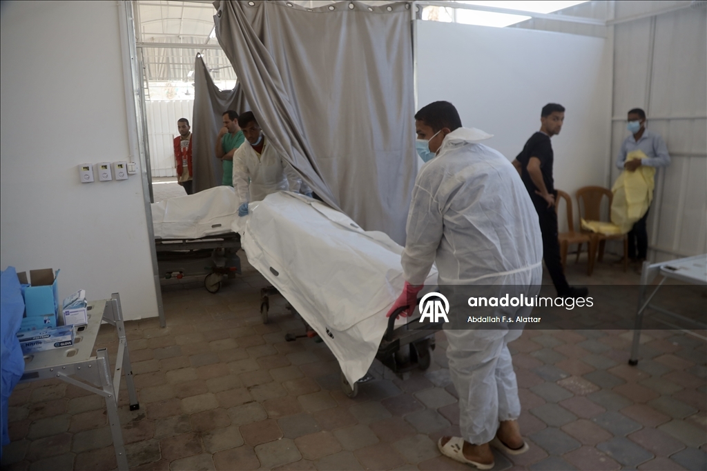 Red Cross delivers bodies of Palestinians handed over under ceasefire deal 