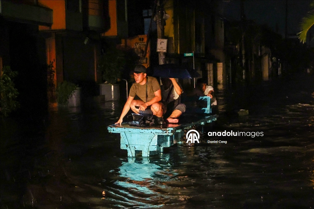 People struggle to recover from aftermath after Typhoon Fung-wong hit Philippines