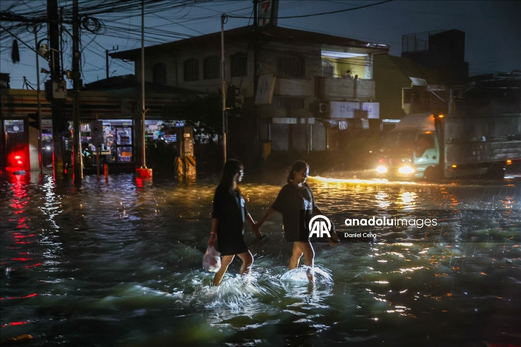 People struggle to recover from aftermath after Typhoon Fung-wong hit Philippines