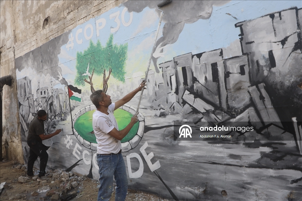 Filistinli ressamlar, Gazze'deki ekolojik kırıma dikkat çekmek için grafiti çizdi 