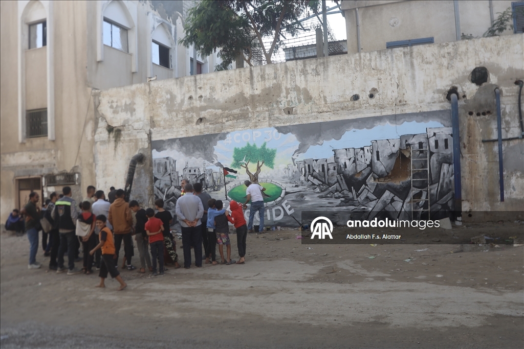 Filistinli ressamlar, Gazze'deki ekolojik kırıma dikkat çekmek için grafiti çizdi 