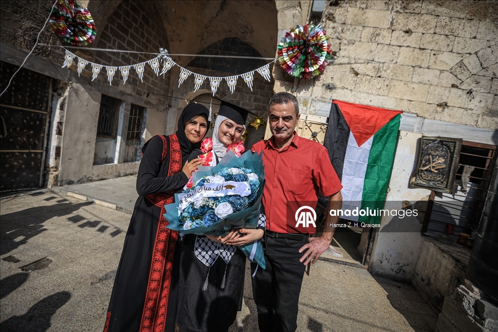 Palestinian student Iman Lulu celebrates exam success amid war-torn Gaza ​​​​​​​ 