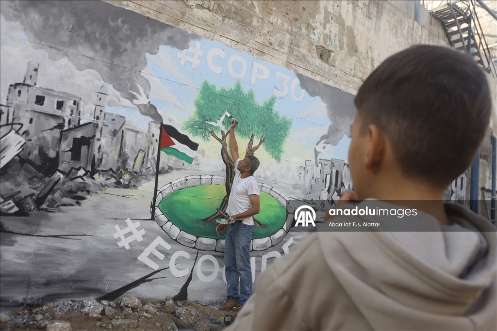 Палестинские художники нарисовали граффити, чтобы привлечь внимание к экологическому разрушению в Газе