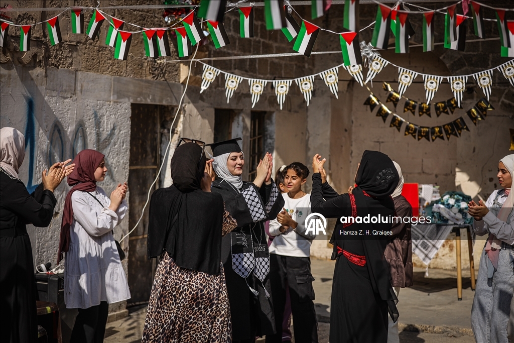 Palestinian student Iman Lulu celebrates exam success amid war-torn Gaza ​​​​​​​ 