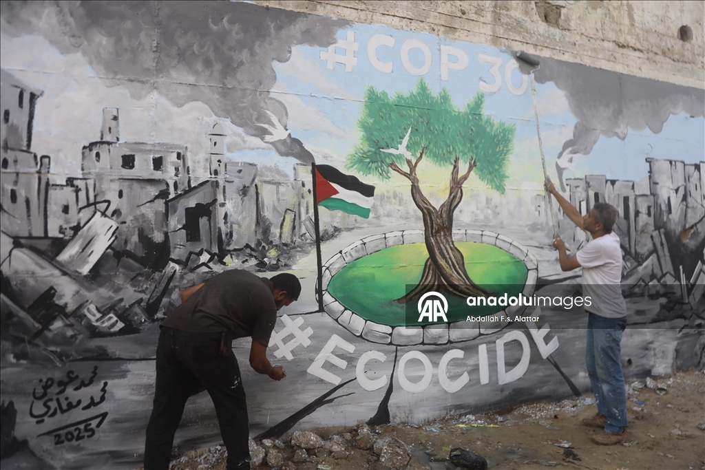 Палестинские художники нарисовали граффити, чтобы привлечь внимание к экологическому разрушению в Газе