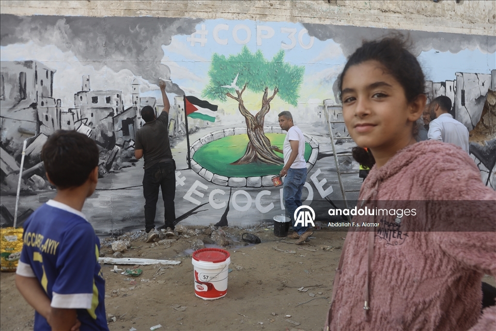 Палестинские художники нарисовали граффити, чтобы привлечь внимание к экологическому разрушению в Газе