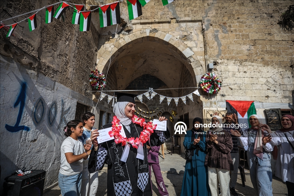 Palestinian student Iman Lulu celebrates exam success amid war-torn Gaza ​​​​​​​ 