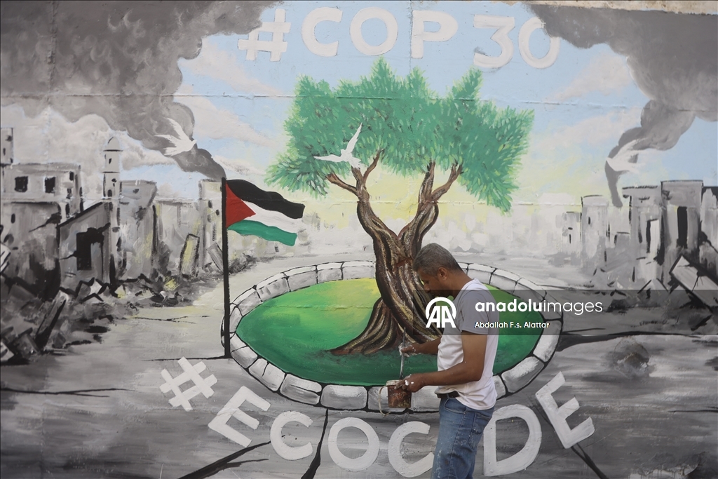 Палестинские художники нарисовали граффити, чтобы привлечь внимание к экологическому разрушению в Газе